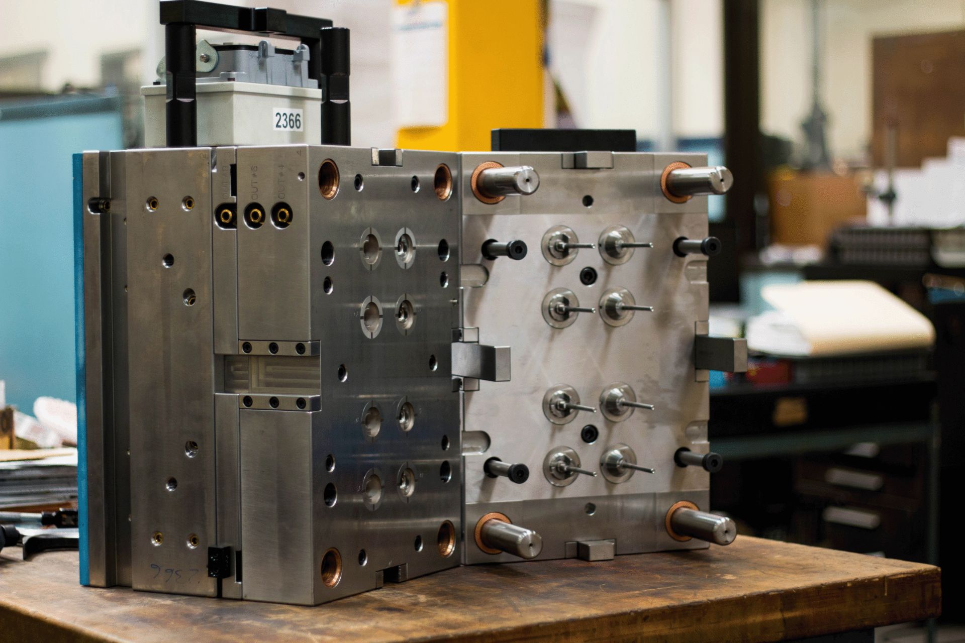 Multi-plate injection mold tool on the shop floor